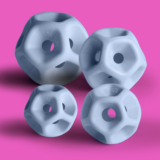 A Soma Flex® sizing set detail shot, against a solid pink background