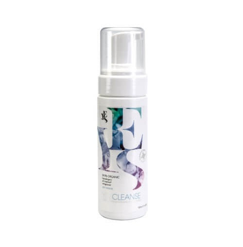 Foam cleanser bottle with a decorative label on a white background