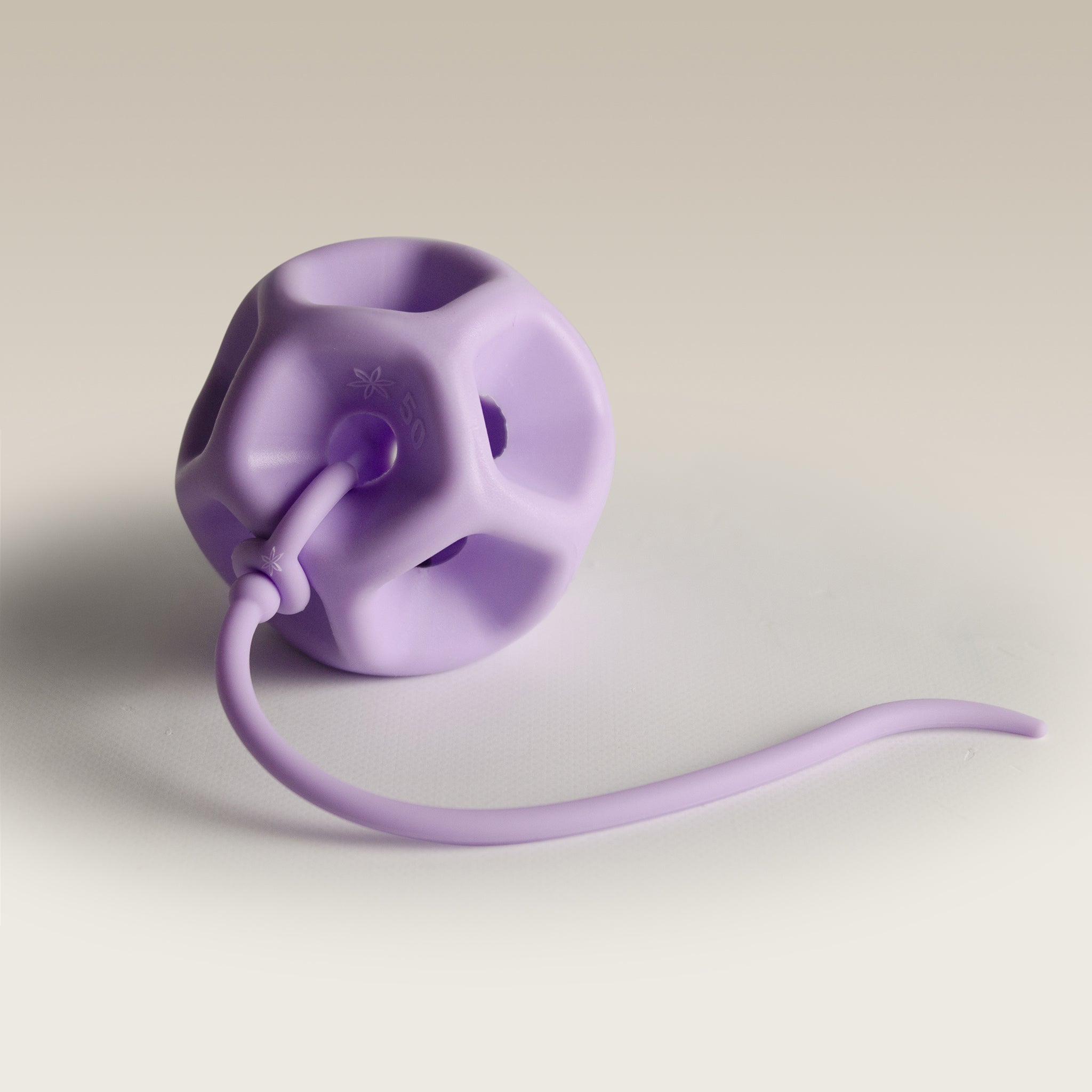 Soma Flex® 50 product shot  with  longer removal cord attached on a plain white surface 3/4 angle shot