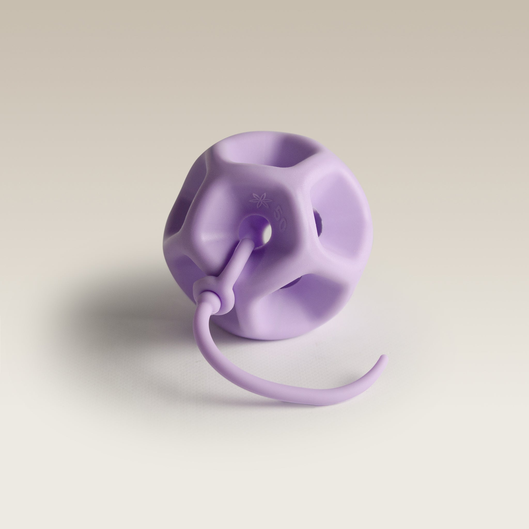 Soma Flex® 50 product shot  with  removal cord attached on a plain white surface 3/4 angle shot