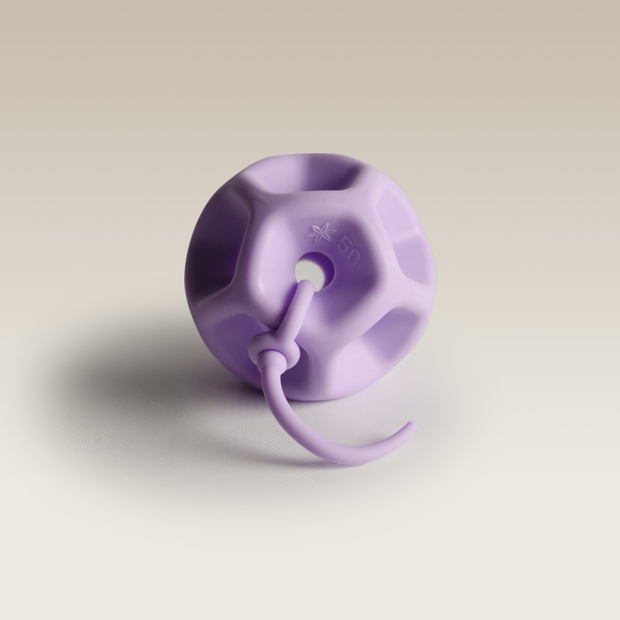 Soma Flex® 50 product shot  with removal cord attached on a plain white surface